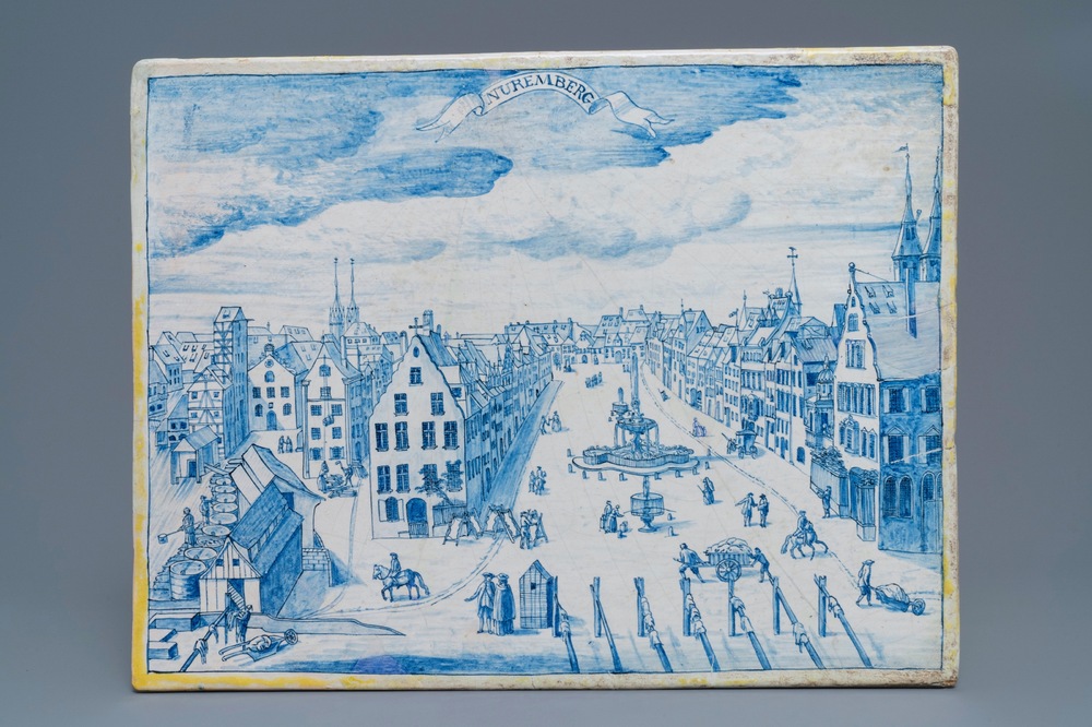 Une plaque en fa&iuml;ence de Delft bleu et blanc &agrave; d&eacute;cor d'une vue de Nuremberg, 18&egrave;me