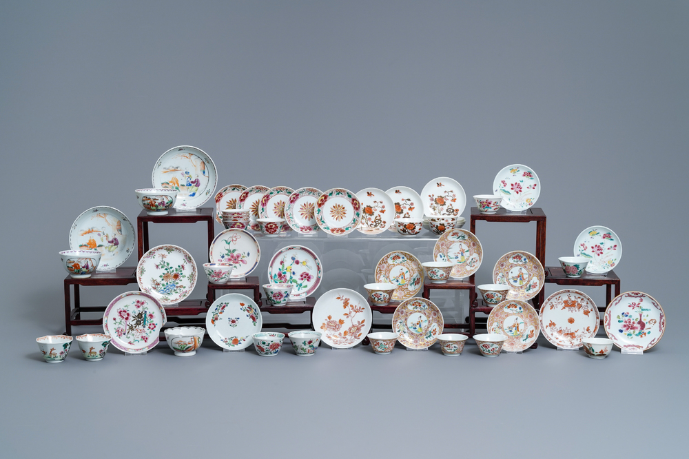 A collection of 26 Chinese famille rose cups and 28 saucers, Yongzheng/Qianlong