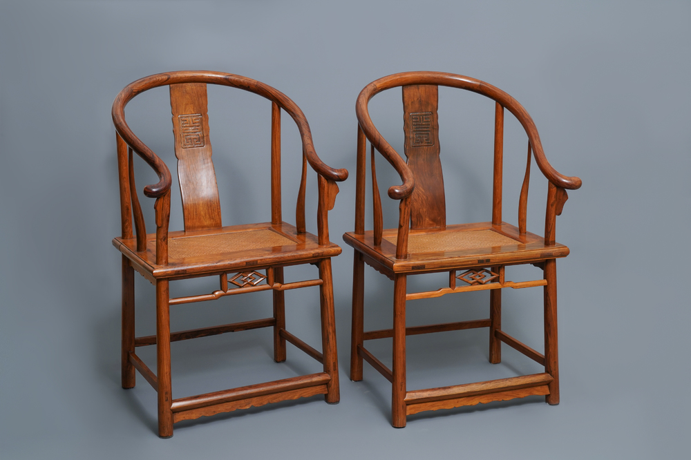 A pair of Chinese huanghuali wood chairs, Republic, 20th C.