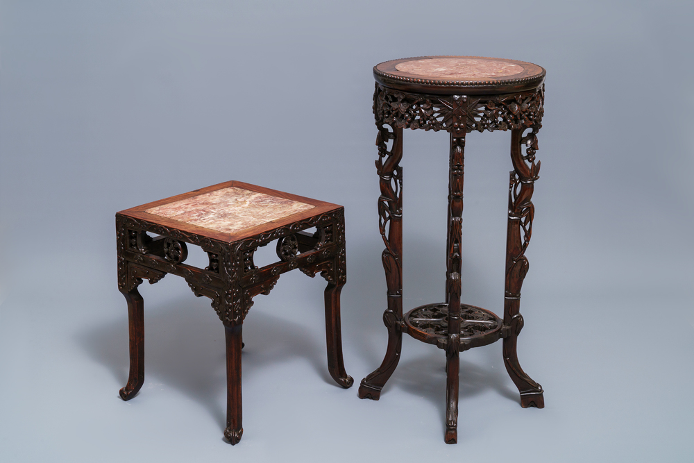 Two Chinese carved wooden stands with marble tops, 19/20th C.