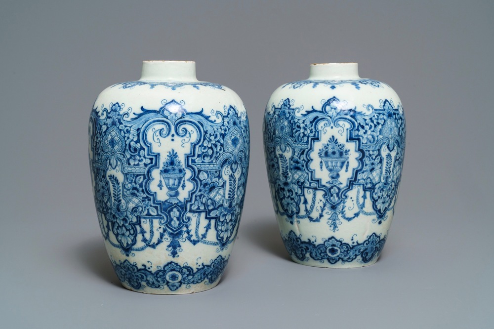 A pair of Dutch Delft blue and white Daniel Marot style vases, early 18th C.