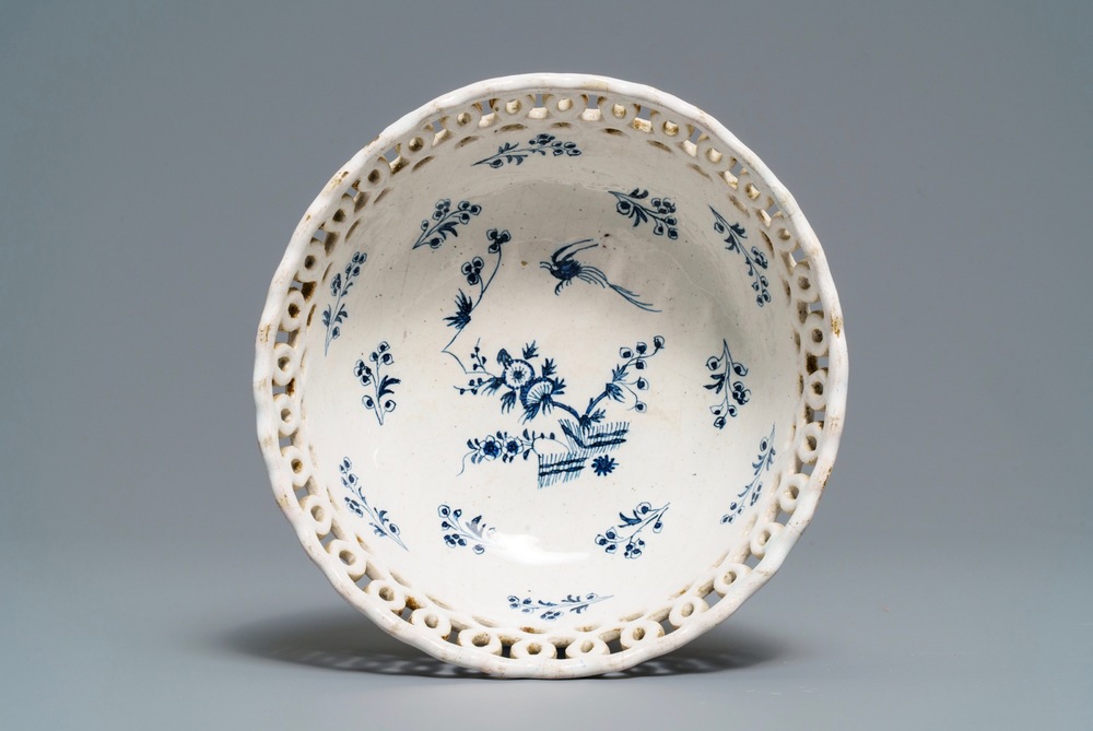 A blue and white Brussels faience '&agrave; la haie fleurie' reticulated basket, 18th C.