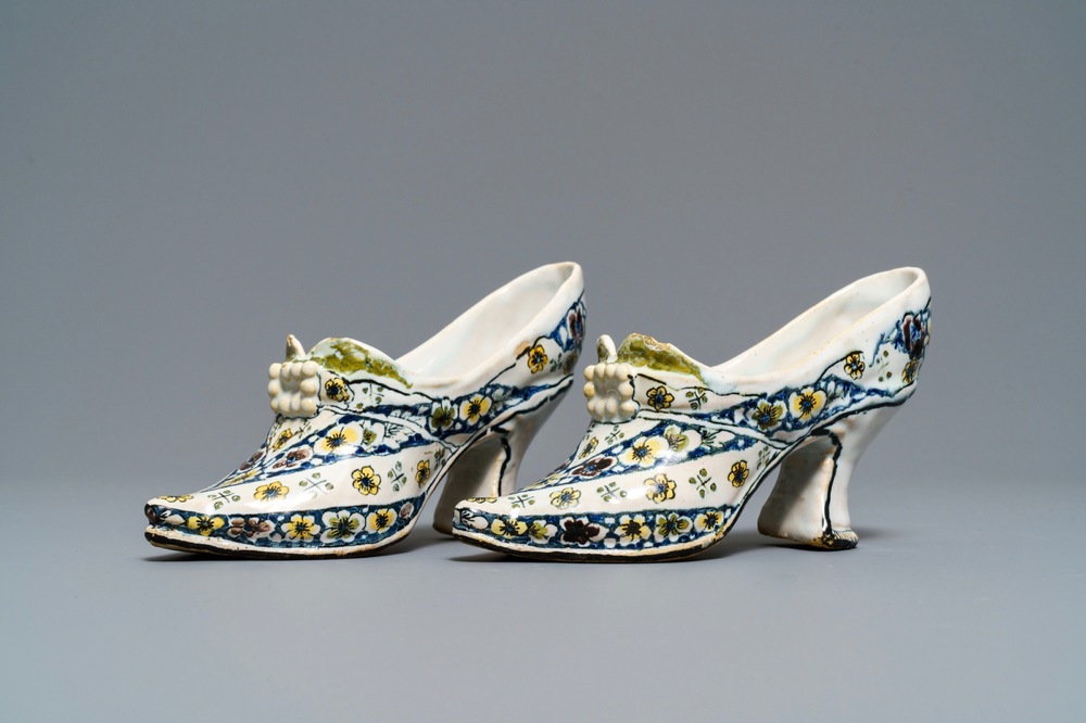 A pair of polychrome French faience lady's shoes, Lille, dated 1751