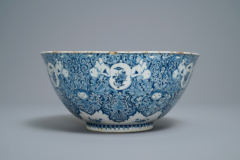 A fine Dutch Delft blue and white 'Commedia dell'arte' bowl, dated 1720