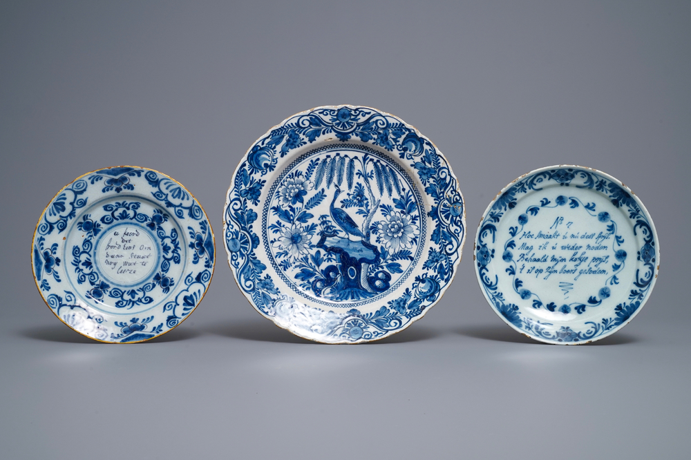 Two Dutch Delft blue and white proverb plates and a dish, 18th C.