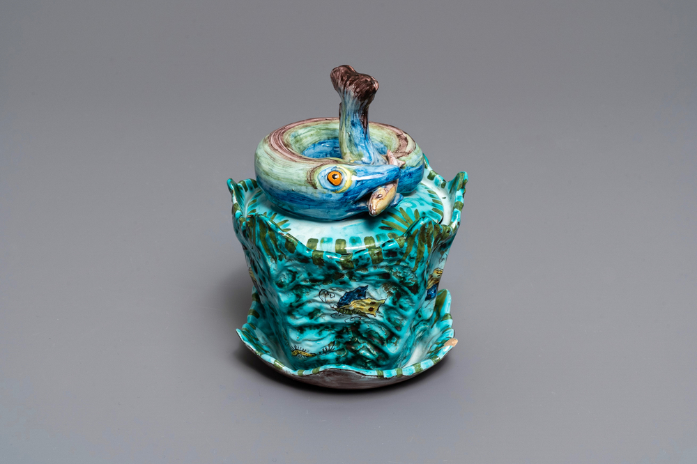 A Brussels faience eel tureen on stand with butterflies and caterpillars, late 18th C.