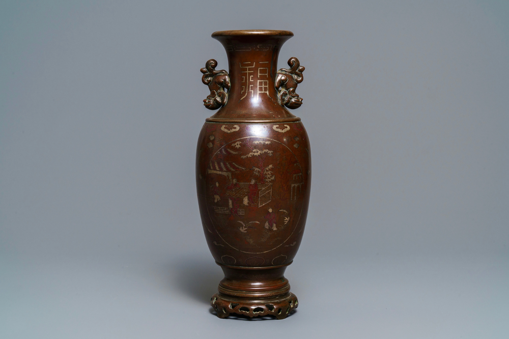 A Chinese or Vietnamese silver-inlaid and inscribed bronze vase, 19th C.