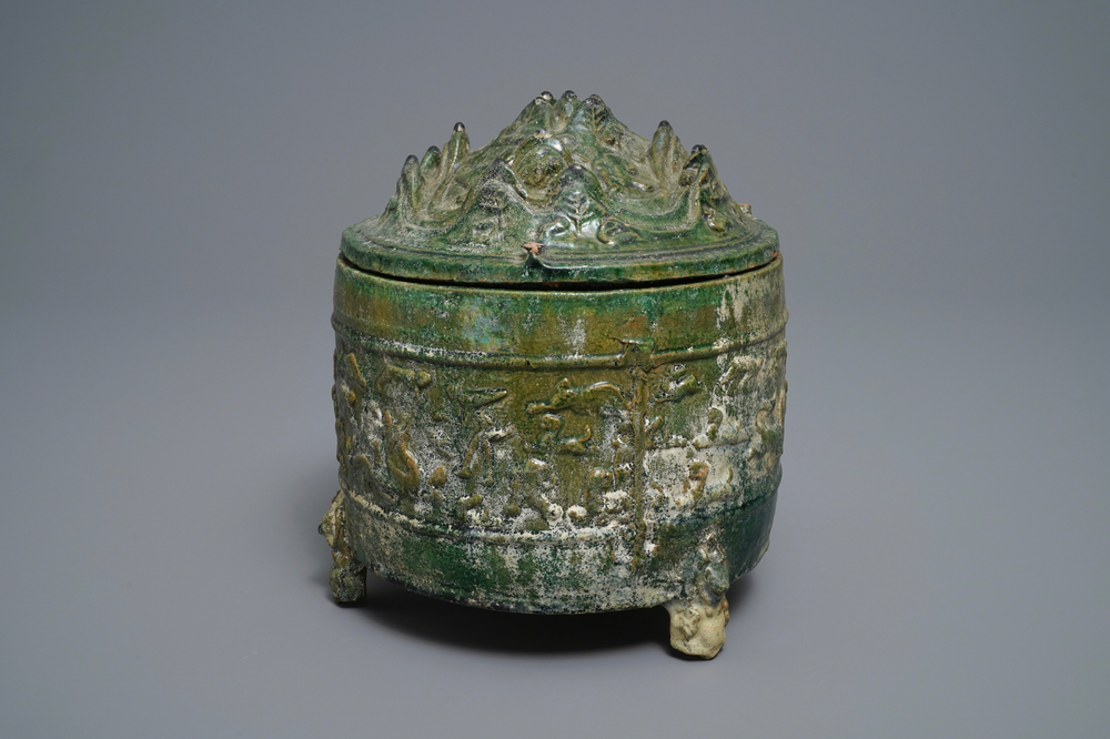 A Chinese green-glazed pottery tripod 'hill' jar, Han