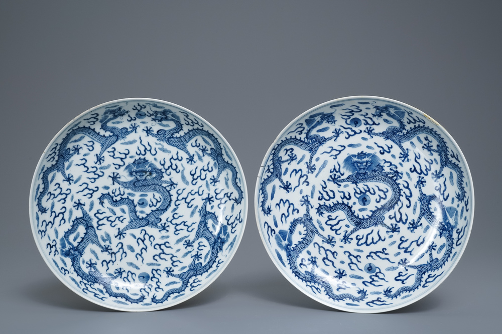 A pair of Chinese blue and white 'dragon' dishes, Kangxi mark, Guangxu