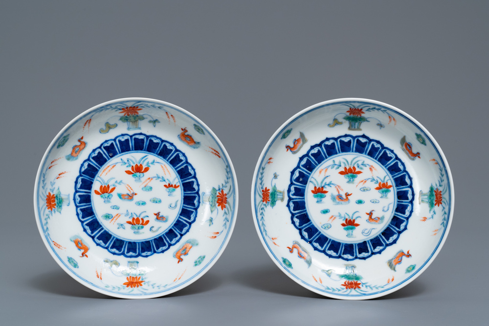 A pair of Chinese doucai 'ducks in a lotus pond' plates, four-character mark, Republic
