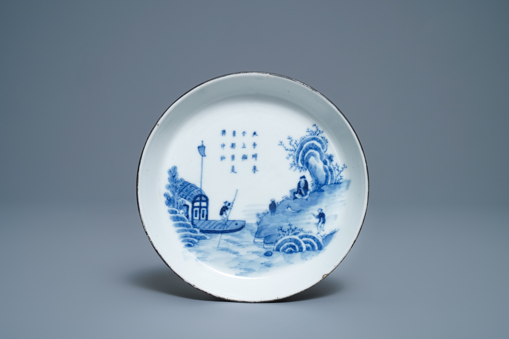A Chinese blue and white Vietnamese market 'Bleu de Hue' dish with a river landscape, 19th C.