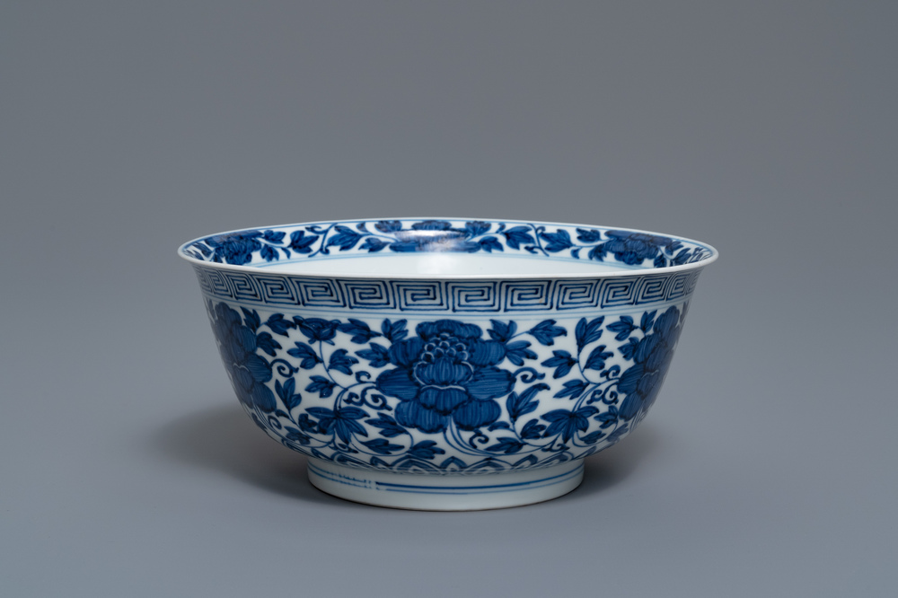 A Chinese blue and white 'peony scroll' bowl, Kangxi