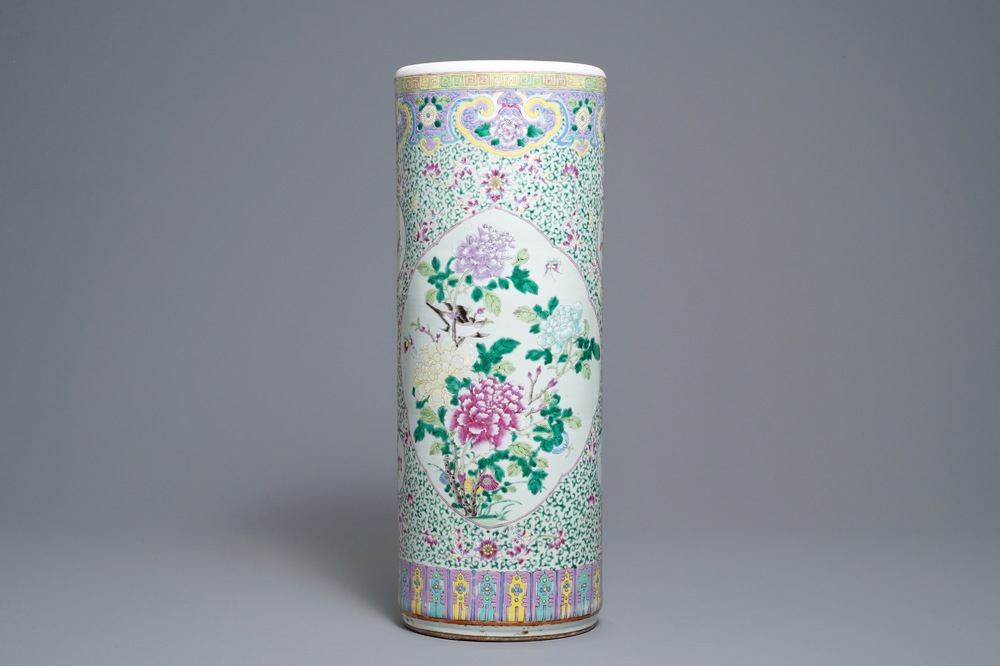 A Chinese famille rose cylindrical vase with birds among flowers, 19th C.