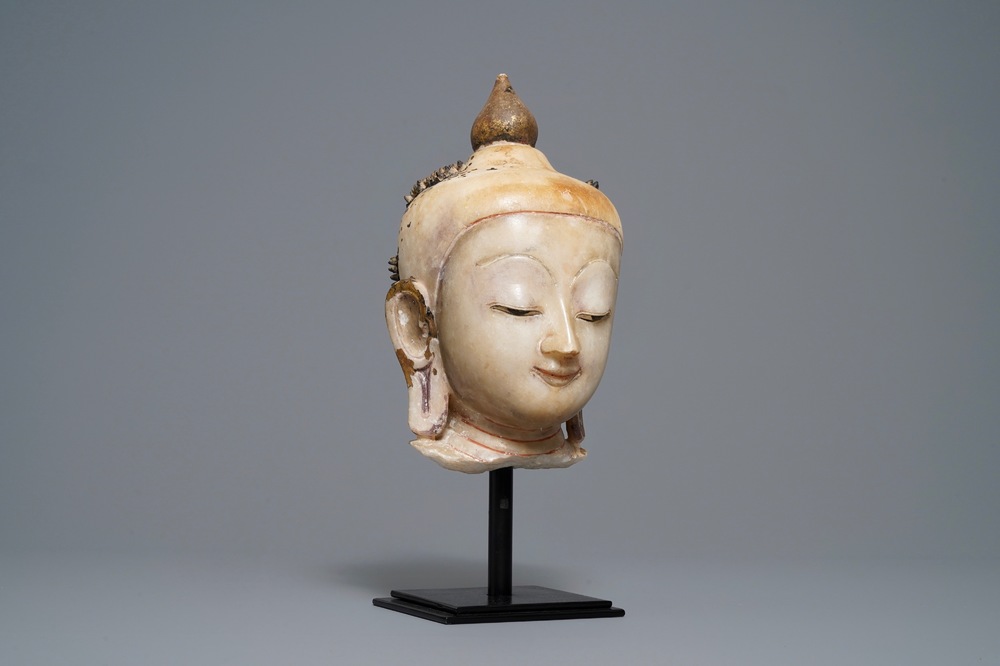 A gilt-lacquered alabaster head of Buddha, Burma, 19th C.