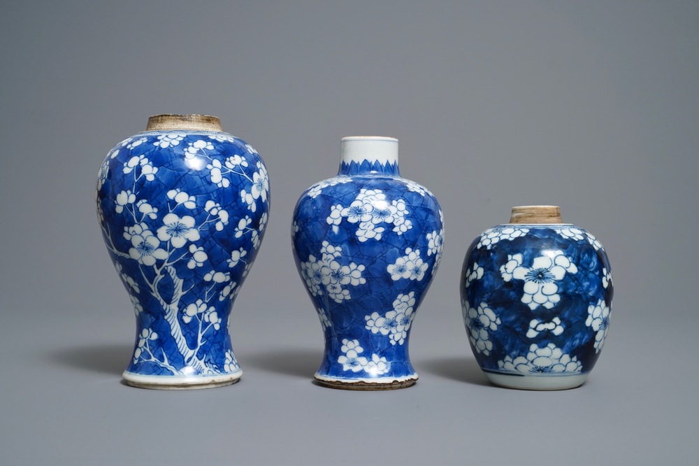 Three Chinese blue and white 'prunus on cracked ice' vases, Kangxi