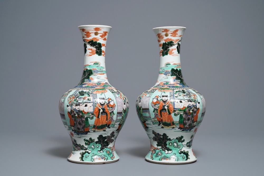 A pair of Chinese famille verte vases with figures on a terrace, Kangxi mark, 19th C.