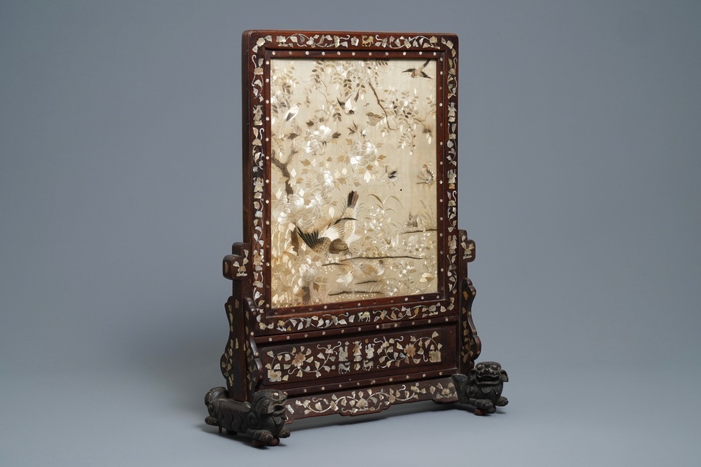 A Chinese mother-of-pearl-inlaid wooden screen with silk embroidery, 19th C.