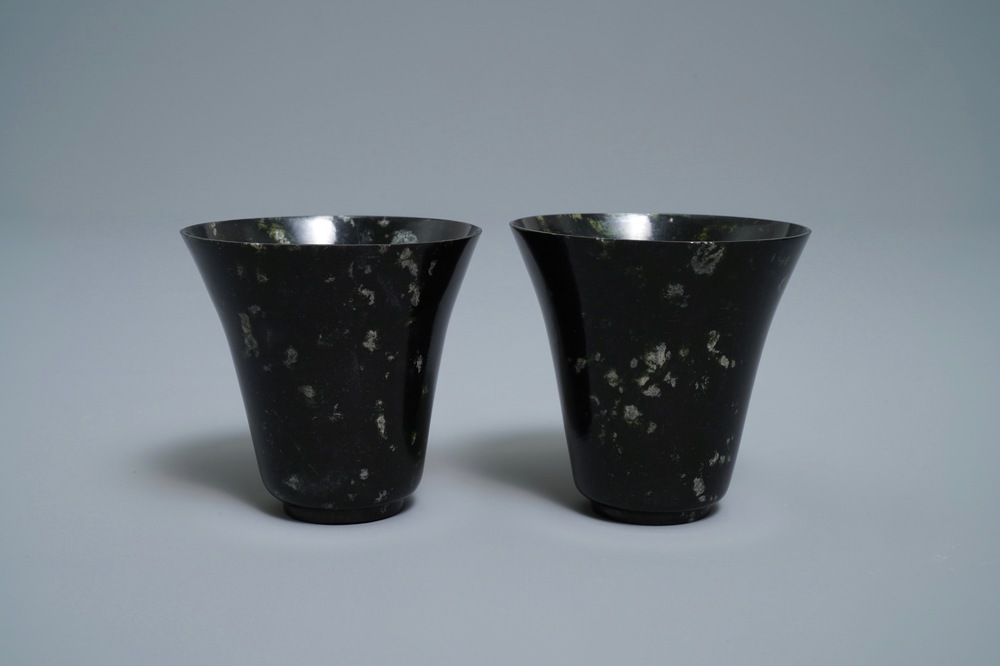 A pair of Chinese dark green jade wine cups, Qing