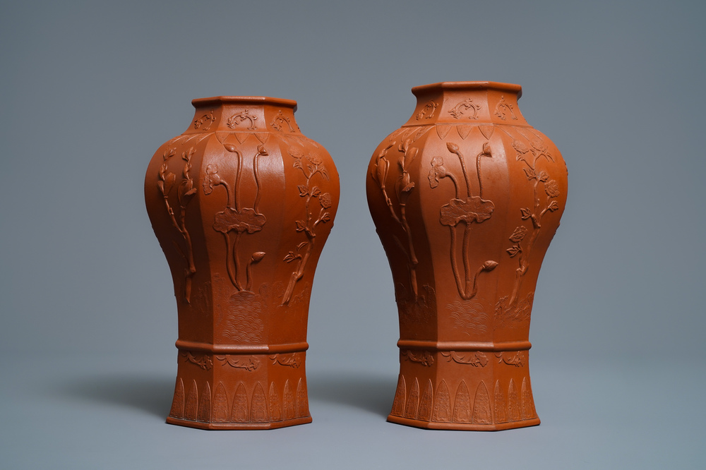 A pair of Chinese Yixing stoneware baluster vases with applied design, Kangxi