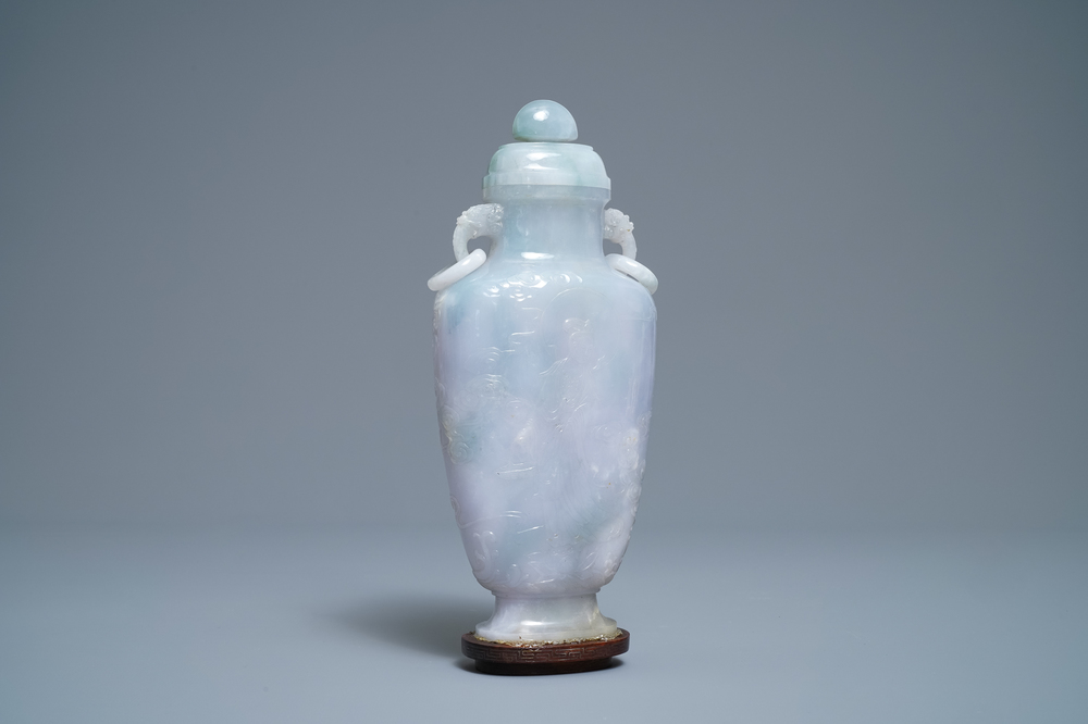 A Chinese jade 'immortals' vase and cover, 19th C.