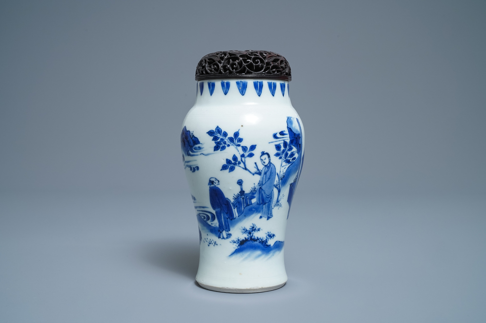 A Chinese blue and white vase with figures in a landscape, Transitional period