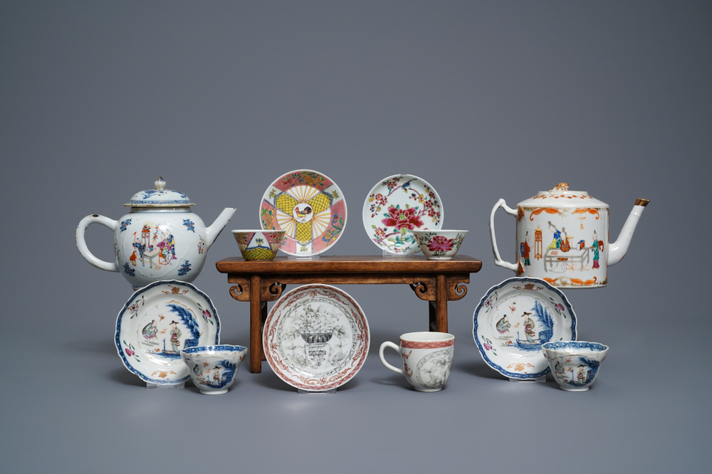 Five Chinese famille rose cups and saucers and two 'Mandarin' teapots, Yongzheng/Qianlong