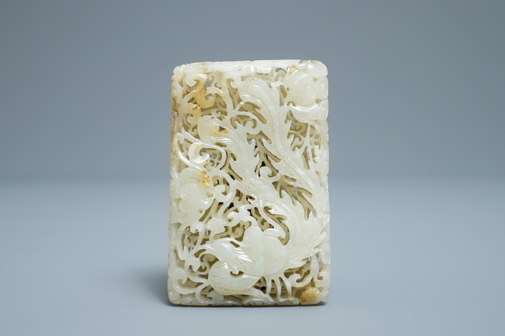 A Chinese reticulated pale celadon jade 'dragon and phoenix' carving, Ming