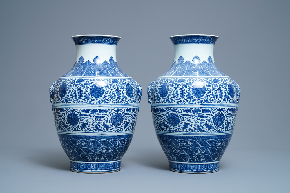 A pair of Chinese blue and white hu vases with floral scrolls, Qianlong mark, 19th C.