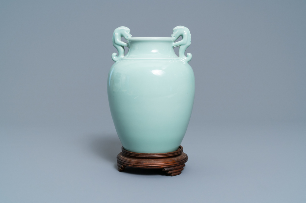 A Chinese monochrome dragon-handled celadon vase, Qianlong mark, 19/20th C.