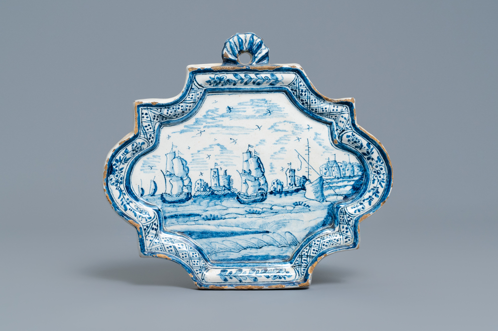A Dutch Delft blue and white 'maritime subject' plaque, 18th C.