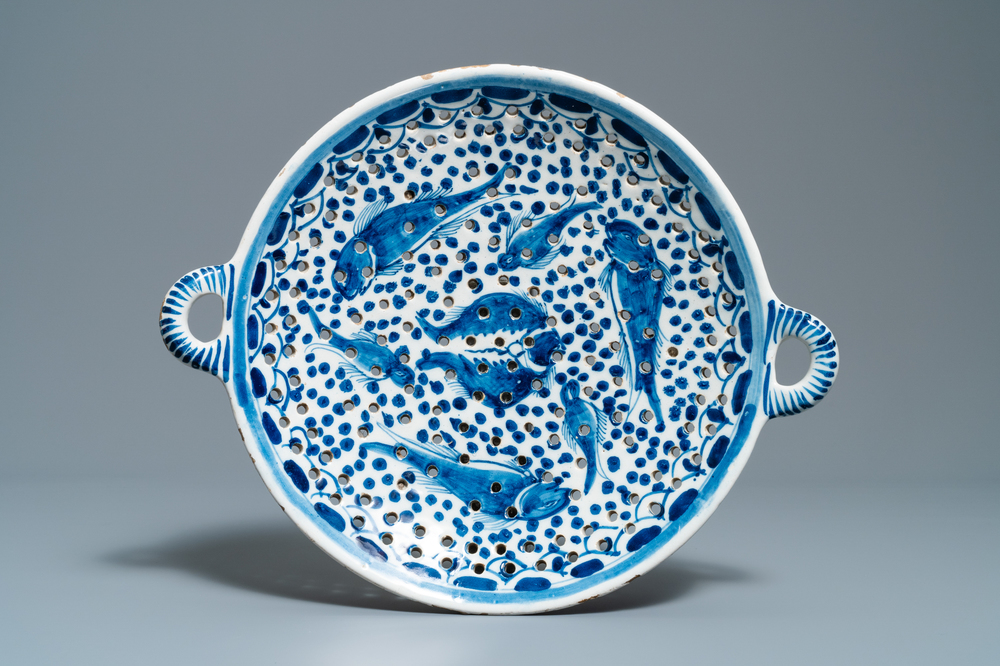 A large Dutch Delft blue and white fish strainer, 18th C.