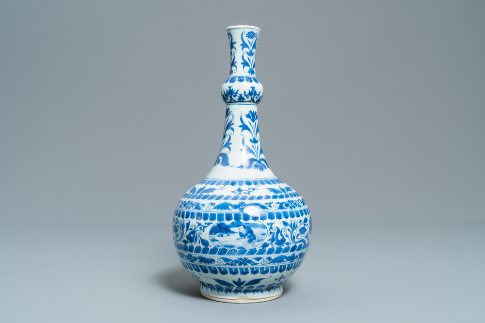 A Chinese blue and white bottle vase with figural medallions, Transitional period