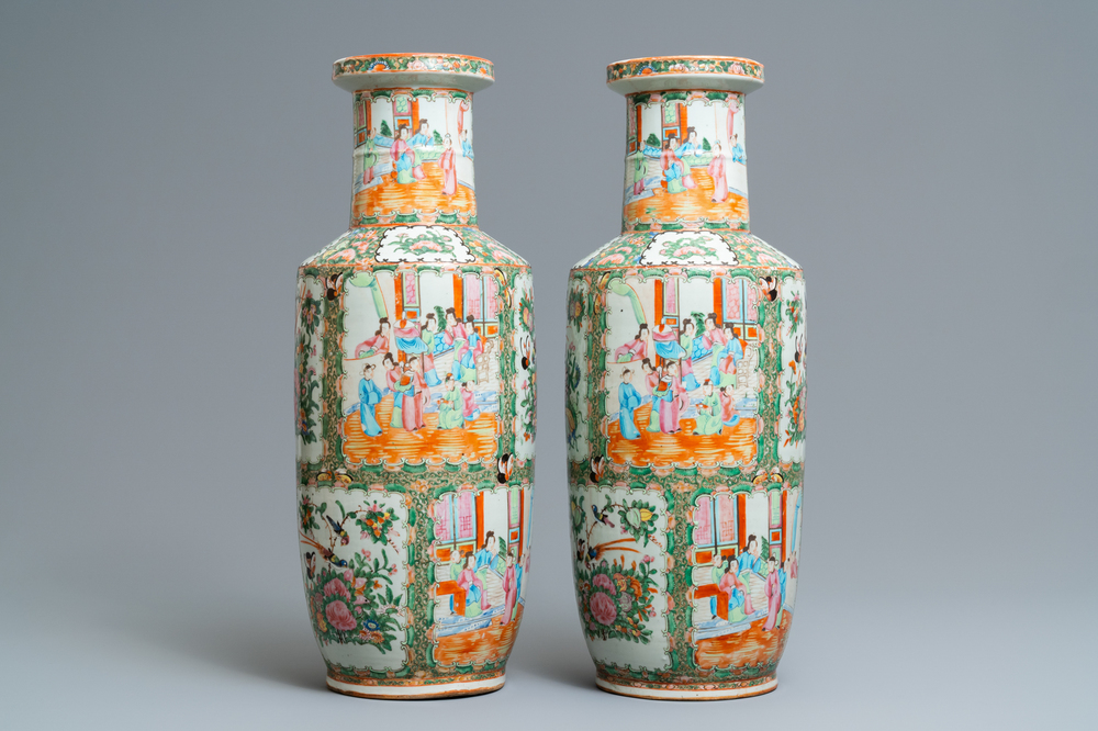 A pair of Chinese Canton famille rose rouleau vases, 19th C.