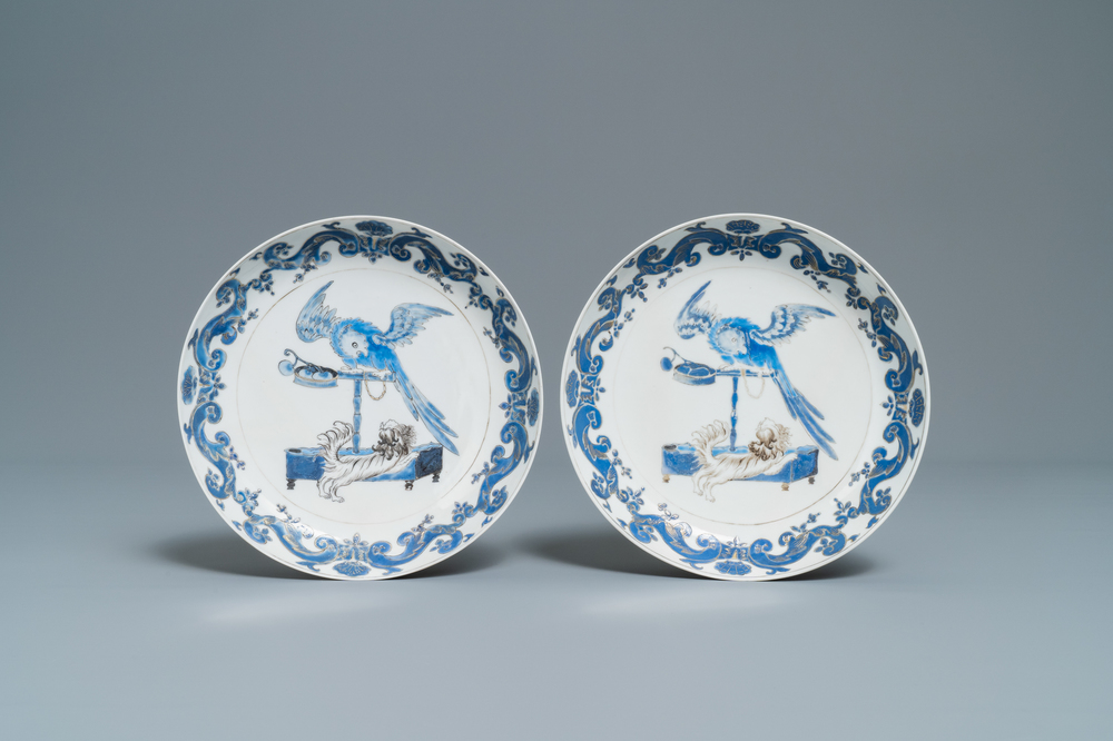 A pair of Chinese Pronk studio eggshell plates with parrots, Yongzheng/Qianlong