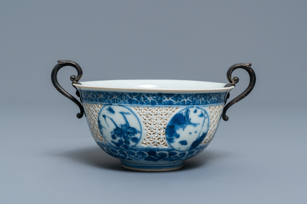 A Chinese silver-mounted blue and white reticulated bowl, Transitional period