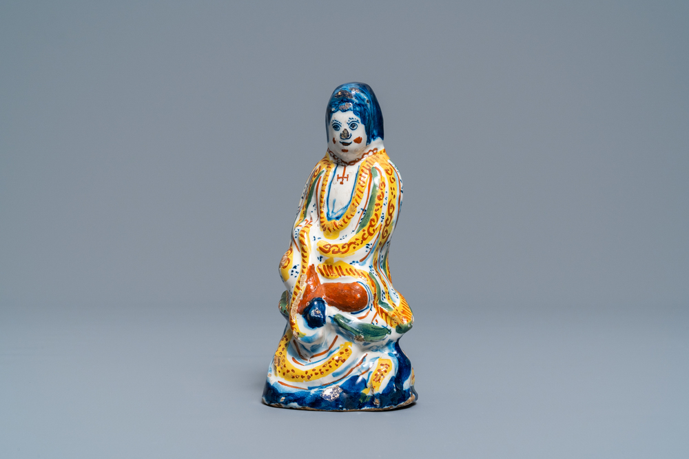 A polychrome Dutch Delft chinoiserie figure of the Chinese goddess Guanyin, 1st quarter 18th C.