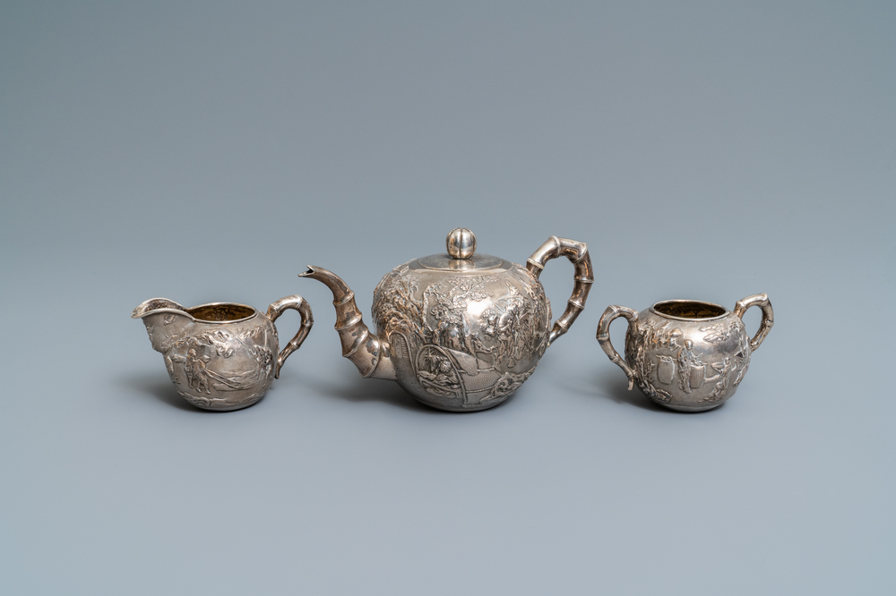A Chinese silver teapot, cream jug and sugar jar, marked Luen Wo - Shanghai, late 19th C.