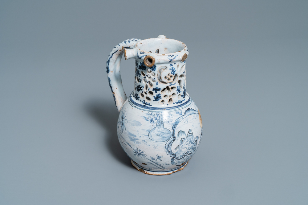 A blue and white Lille faience puzzle jug, 18th C.