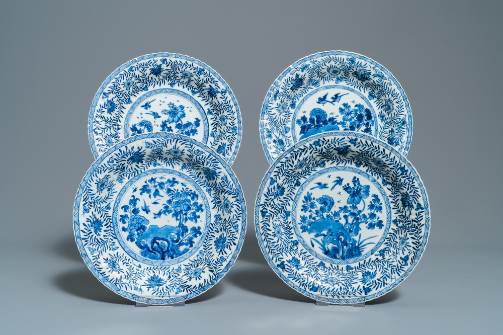 Four Chinese blue and white lobed dishes with floral design, Kangxi