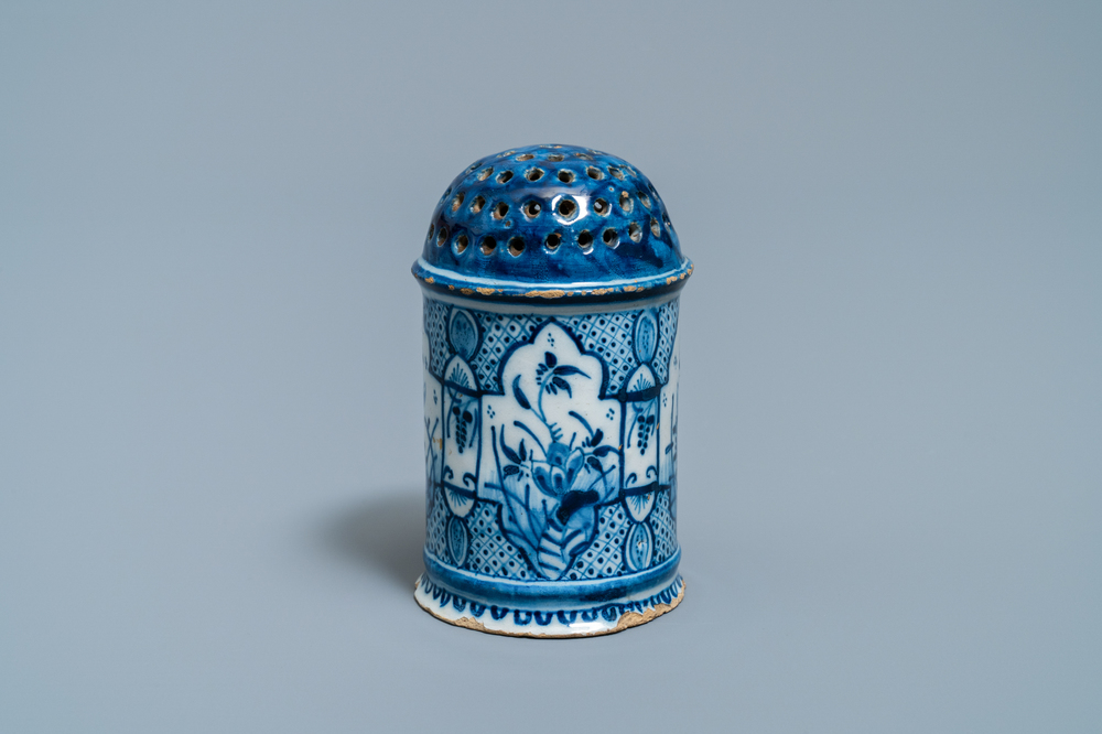 A Dutch Delft blue and white caster, 18th C.