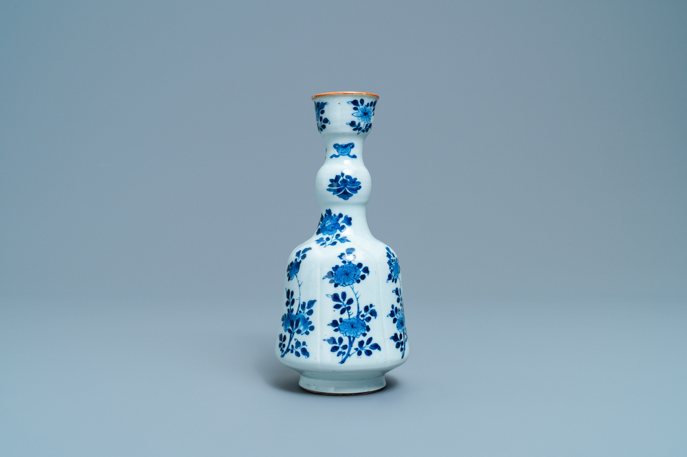 A Chinese blue and white elongated huqqa base with floral design, Kangxi