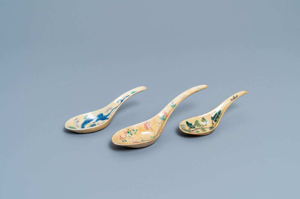 Three Chinese famille rose caf&eacute;-au-lait-ground spoons, Daoguang mark and of the period