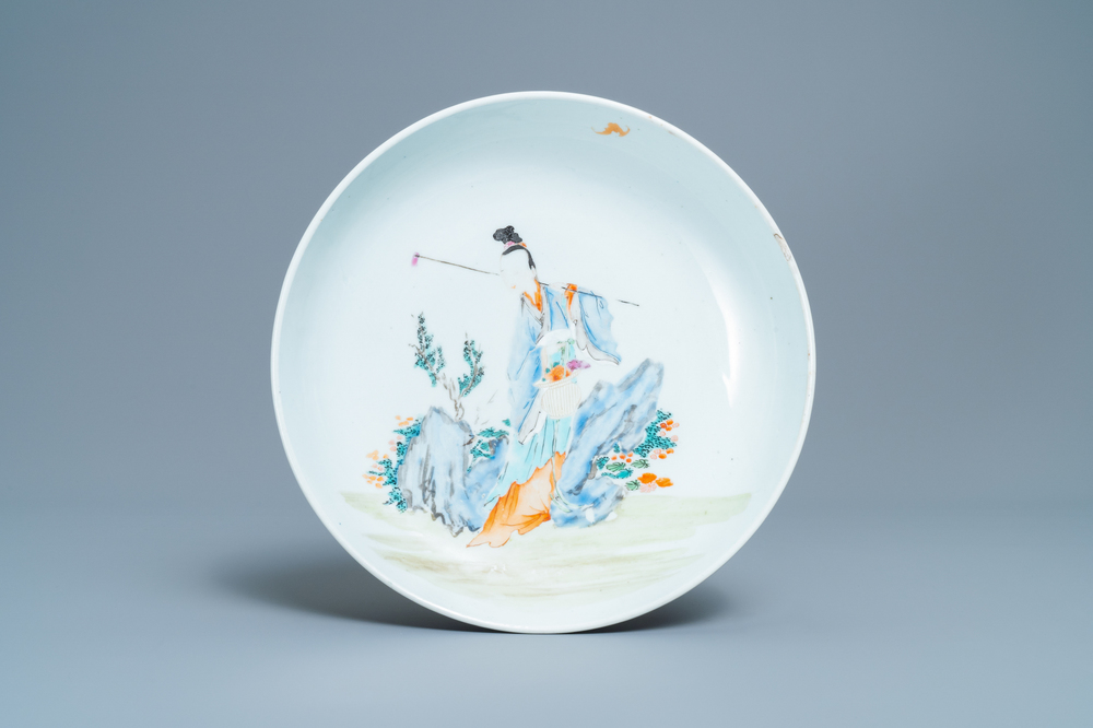 A Chinese famille rose dish with a lady in a landscape, Yongzheng