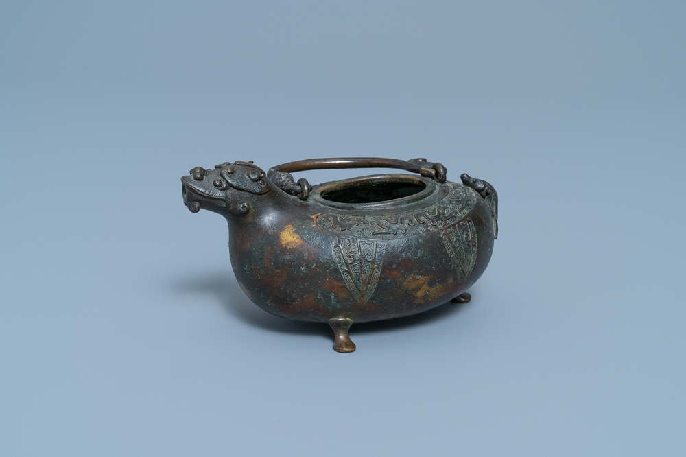 A Chinese bronze dragon-shaped ewer, Qing