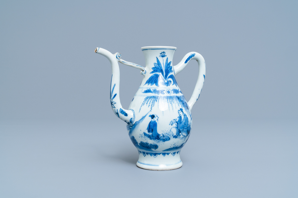 A Chinese blue and white ewer with figures in a landscape, Transitional period