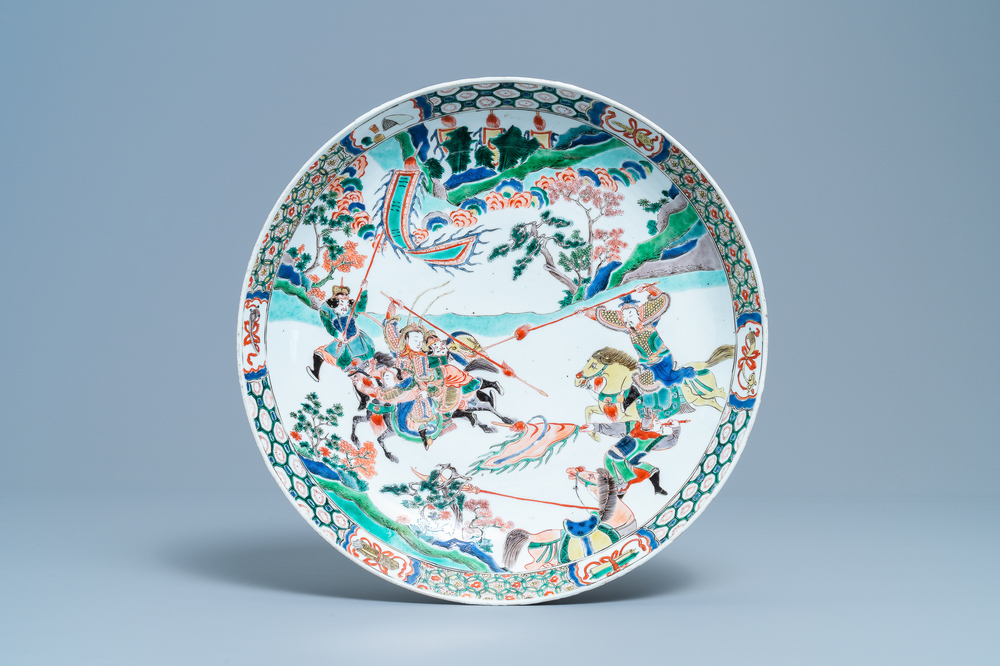 A Chinese famille verte dish with warriors on horseback, Kangxi