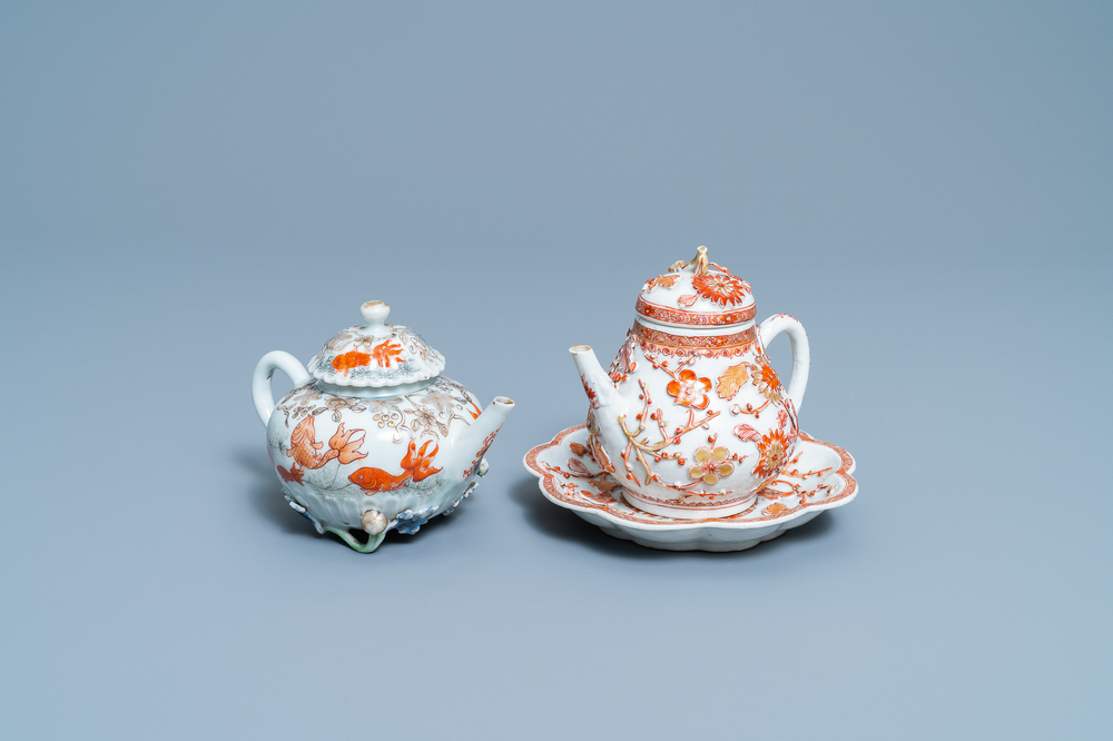 Two Chinese iron red and gilt relief-decorated teapots and one stand, Kangxi/Yongzheng