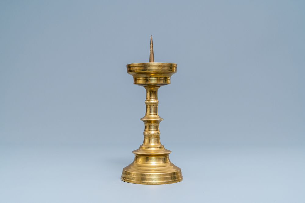 A Flemish bronze candlestick, 15/16th C.