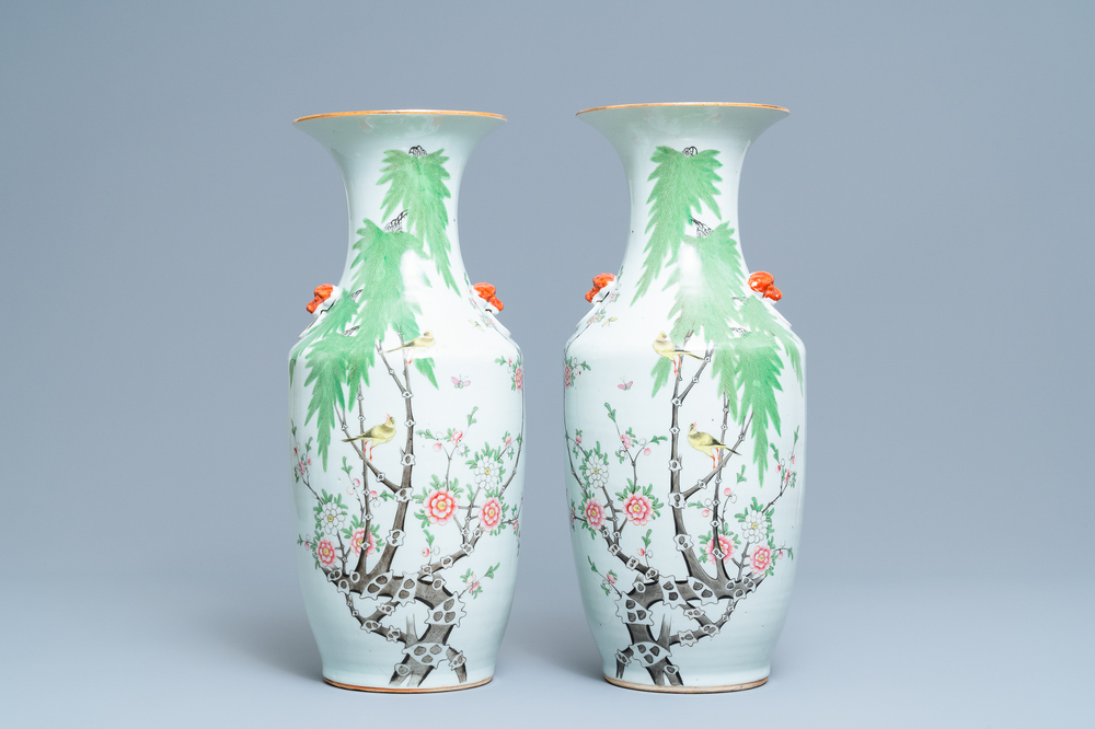A pair of Chinese famille rose vases with birds among blossoming branches, 19/20th C.
