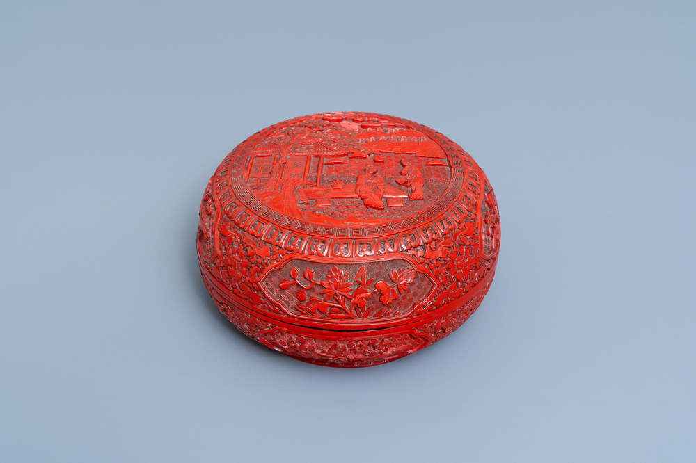 A Chinese red cinnabar lacquer box and cover, 19th C.